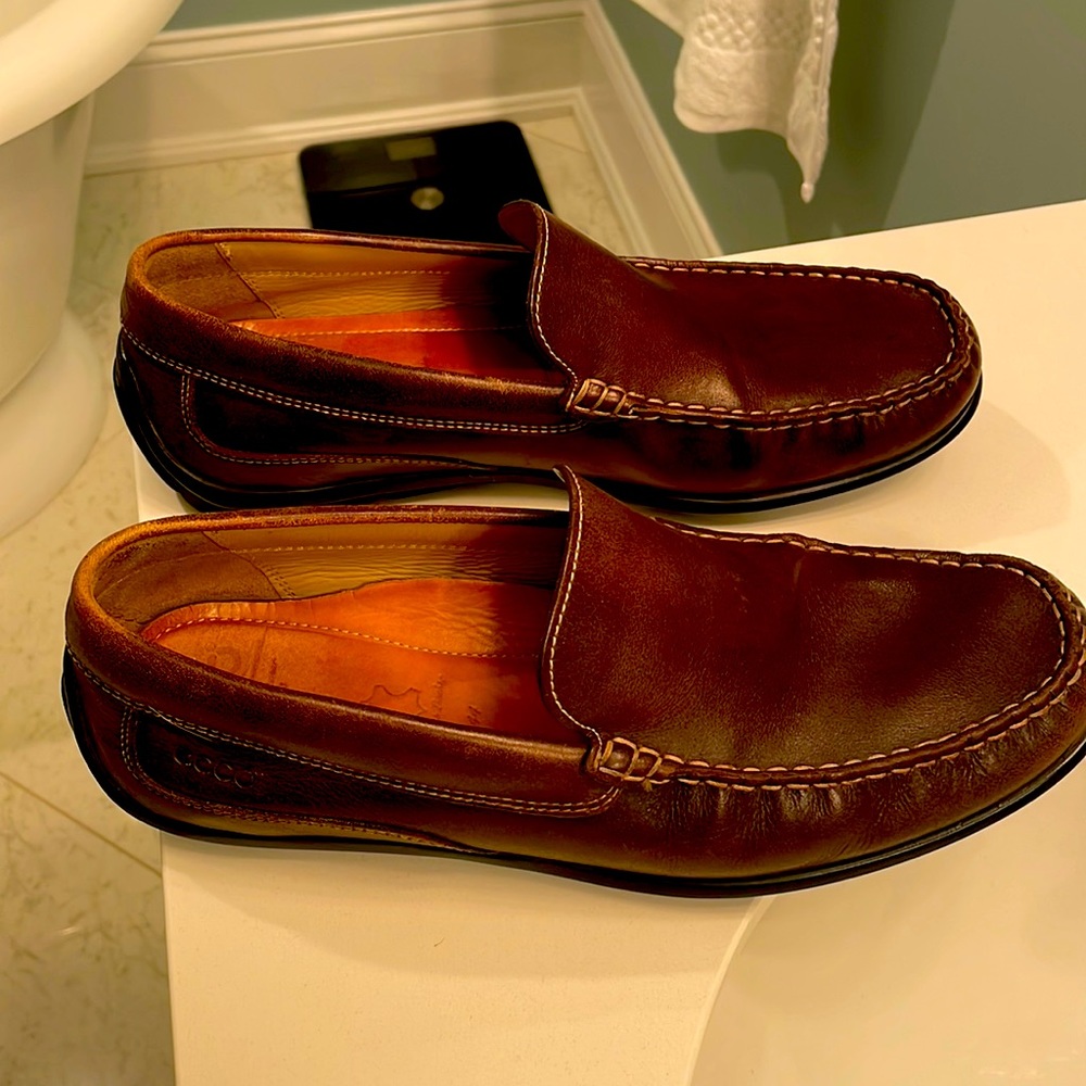 Ecco brown slip on loafers.